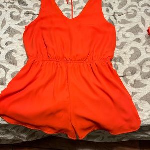 One heart clothing orange tank deep v romper with tie in back